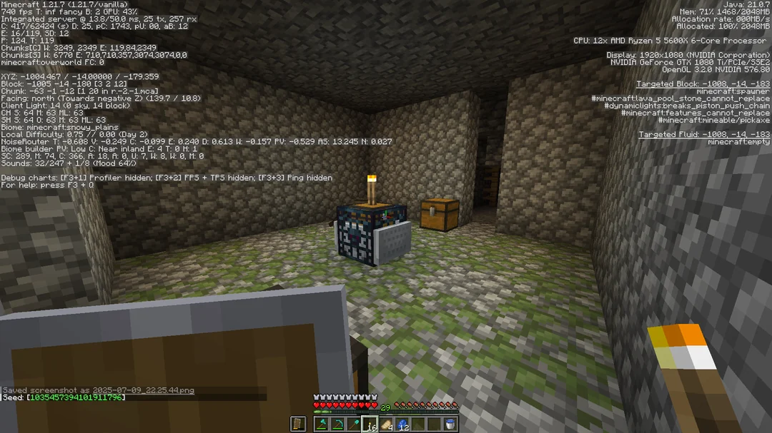 Naturally occurring minecart chest inside of a spider spawner